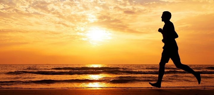 man running on beach